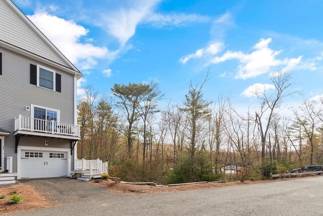 30 Compass Pt Unit 30, North Andover, MA 01845 - view of property exterior with a garage and driveway