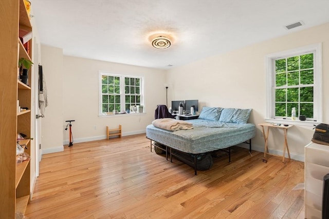 35 Fredonian St Unit K, Shirley, MA 01464 - bedroom with light wood-style flooring and baseboards