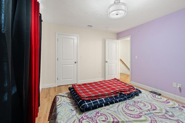 35 Fredonian St Unit K, Shirley, MA 01464 - bedroom with light wood-style flooring and baseboards