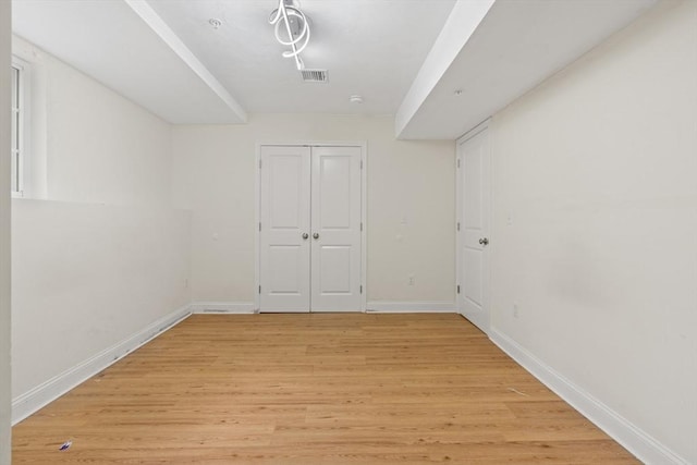 35 Fredonian St Unit K, Shirley, MA 01464 - unfurnished bedroom with light wood-style flooring and a closet