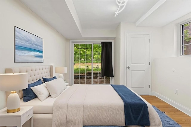 35 Fredonian St Unit K, Shirley, MA 01464 - bedroom featuring wood finished floors and multiple windows