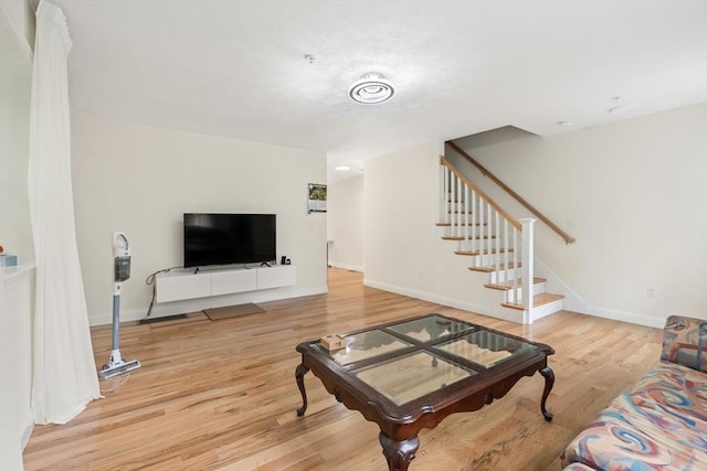 35 Fredonian St Unit K, Shirley, MA 01464 - living area with stairway and light wood-type flooring