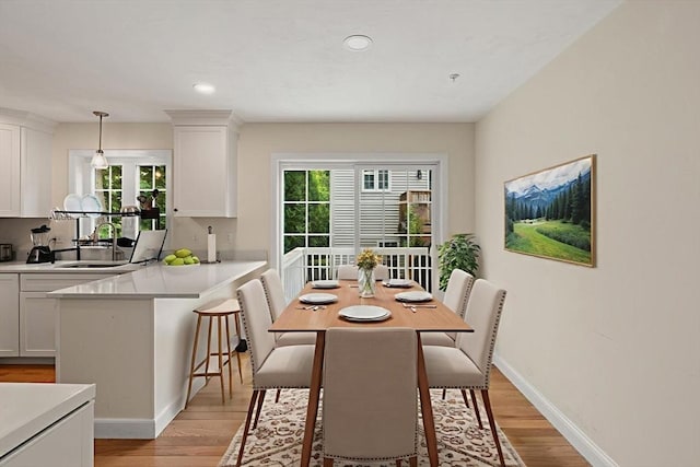 35 Fredonian St Unit K, Shirley, MA 01464 - dining space featuring healthy amount of natural light, light wood-type flooring, and recessed lighting