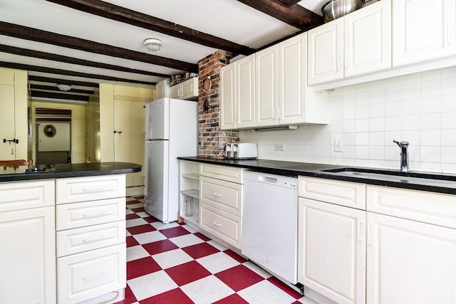79 Nobscot Rd, Sudbury, MA 01776 - kitchen with white appliances, light floors, a sink, white cabinetry, and dark countertops