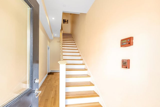 37-39 Lamson St Unit 2, Boston, MA 02128 - stairway with wood finished floors, recessed lighting, and baseboards