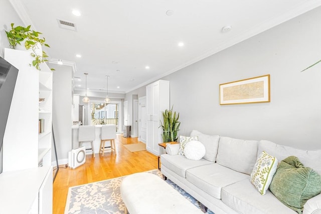 37-39 Lamson St Unit 2, Boston, MA 02128 - living area featuring light wood-style floors, crown molding, recessed lighting, and baseboards