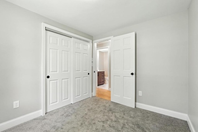 147 Mort Vining Rd, Southwick, MA 01077 - unfurnished bedroom with carpet and a closet