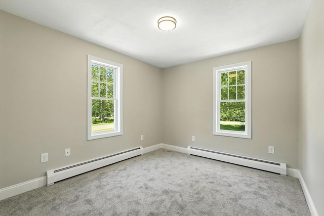 147 Mort Vining Rd, Southwick, MA 01077 - empty room featuring a baseboard heating unit and carpet flooring