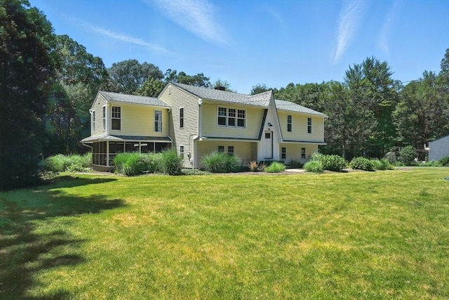 147 Mort Vining Rd, Southwick, MA 01077 - view of front of home with a front lawn and a sunroom