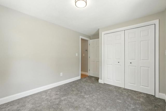 147 Mort Vining Rd, Southwick, MA 01077 - unfurnished bedroom featuring carpet flooring and a closet