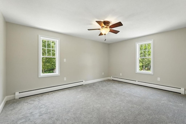 147 Mort Vining Rd, Southwick, MA 01077 - carpeted empty room featuring baseboard heating, healthy amount of natural light, and ceiling fan