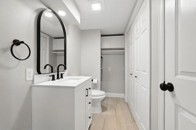 147 Mort Vining Rd, Southwick, MA 01077 - bathroom with vanity, wood finished floors, and a closet