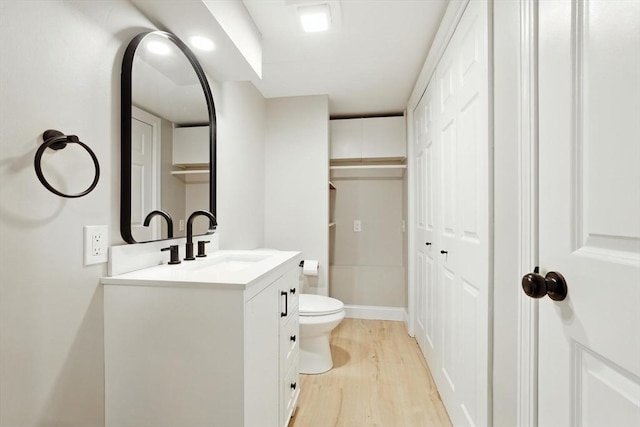 147 Mort Vining Rd, Southwick, MA 01077 - bathroom with vanity, wood finished floors, and a closet