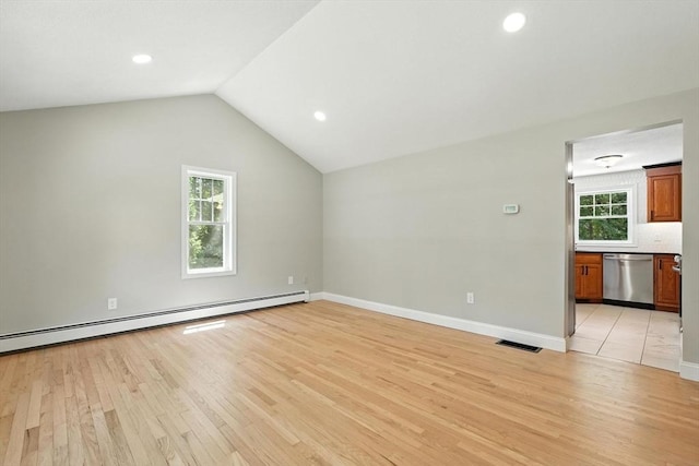 147 Mort Vining Rd, Southwick, MA 01077 - additional living space with a baseboard heating unit, light wood-style flooring, vaulted ceiling, and recessed lighting