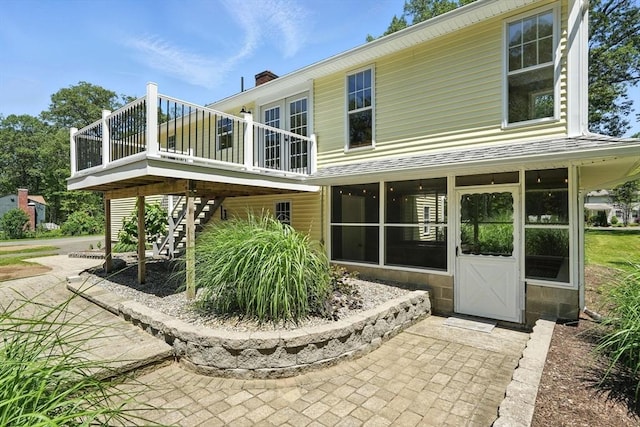 147 Mort Vining Rd, Southwick, MA 01077 - rear view of house with stairs and a wooden deck