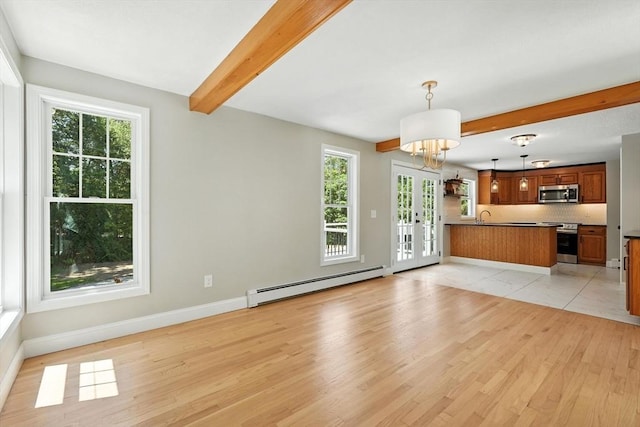 147 Mort Vining Rd, Southwick, MA 01077 - unfurnished living room featuring a baseboard radiator, beam ceiling, light wood-style flooring, and a chandelier