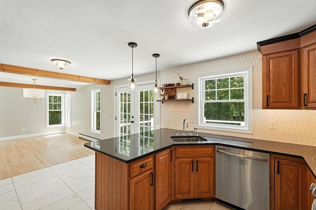 147 Mort Vining Rd, Southwick, MA 01077 - kitchen featuring stainless steel dishwasher, brown cabinets, healthy amount of natural light, a textured ceiling, and beam ceiling
