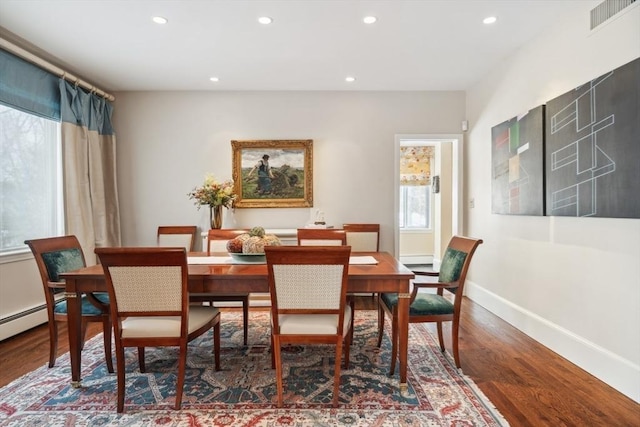 dining room featuring wood-type flooring