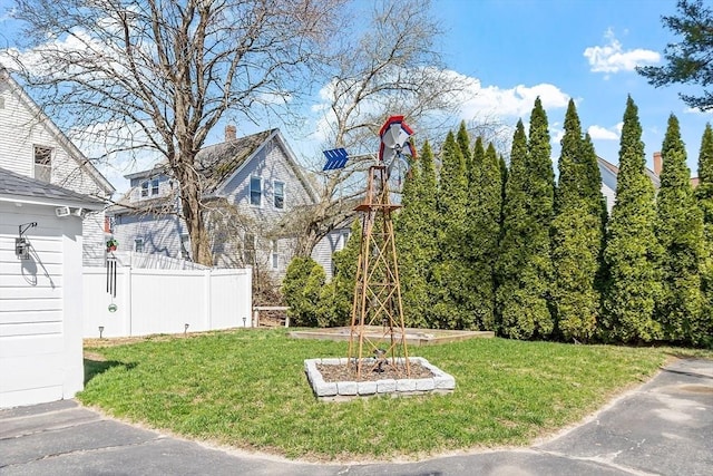 view of yard featuring fence