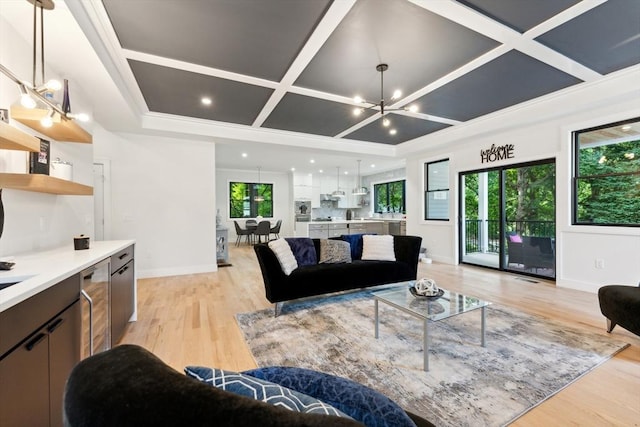 living room with a chandelier, light hardwood / wood-style flooring, and coffered ceiling