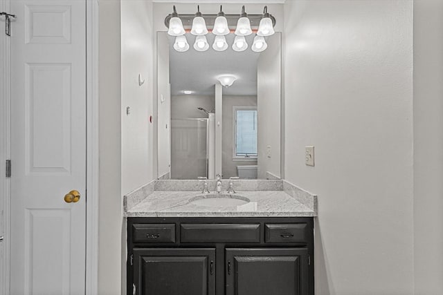 bathroom featuring vanity and walk in shower