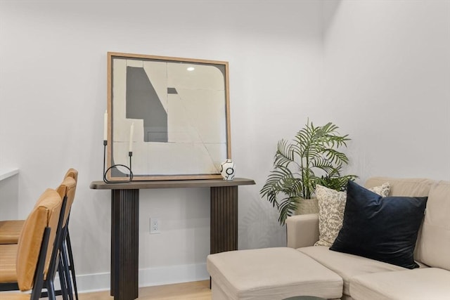 sitting room featuring wood finished floors and baseboards