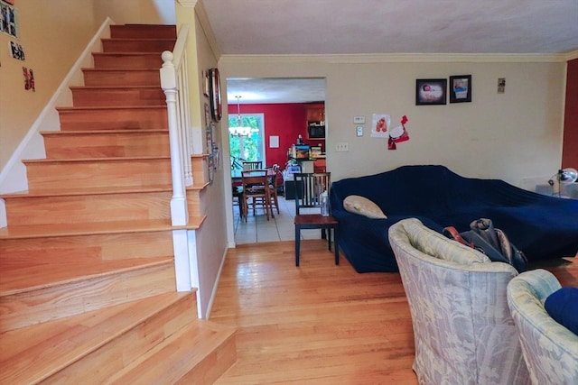 2 Altavesta Cir Unit A, Woburn, MA 01801 - living room featuring stairway, light wood-style floors, and ornamental molding