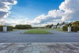 view of road featuring curbs