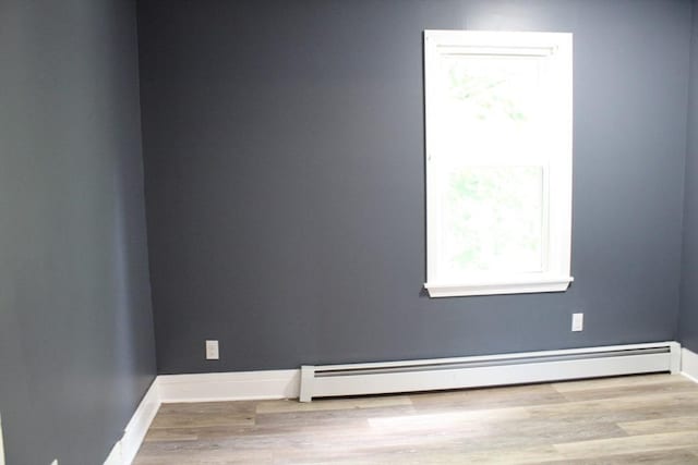 34-36 Glenallen St, Winchendon, MA 01475 - empty room featuring a baseboard radiator and wood finished floors