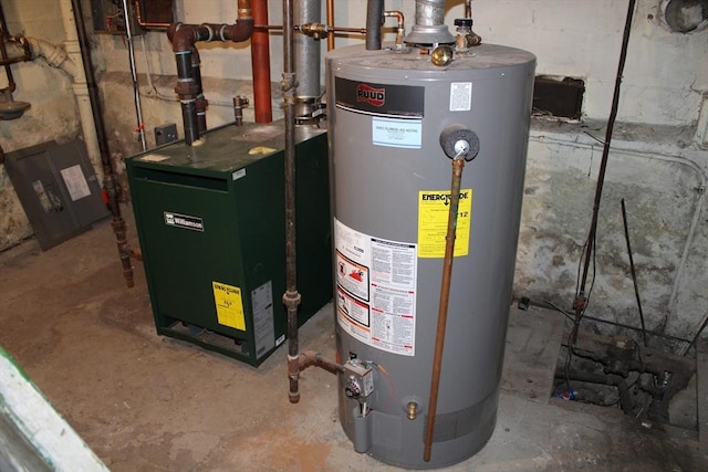 utility room featuring gas water heater and a heating unit