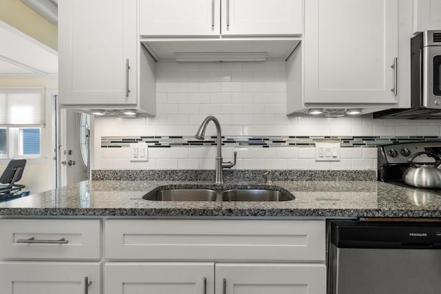 17 Chandler Rd, Malden, MA 02148 - kitchen featuring dishwasher, a sink, white cabinets, and tasteful backsplash