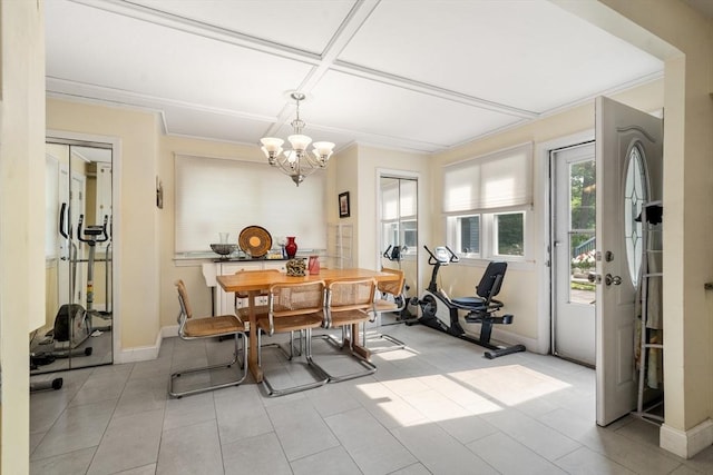 17 Chandler Rd, Malden, MA 02148 - dining space featuring a chandelier, baseboards, crown molding, and light tile patterned floors