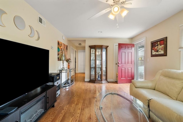 17 Chandler Rd, Malden, MA 02148 - living room with light wood finished floors and ceiling fan