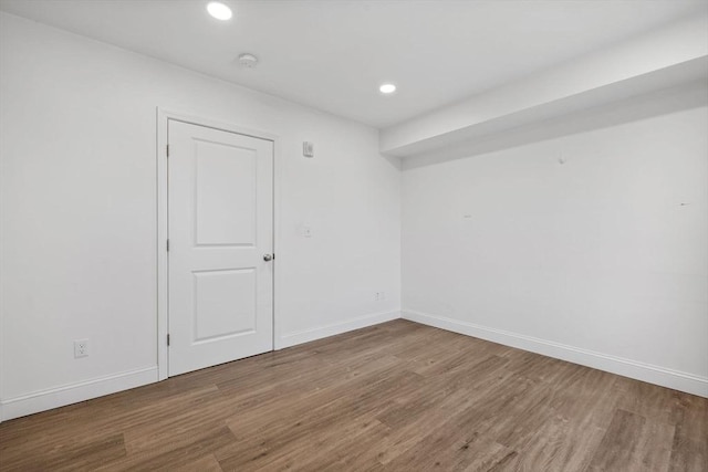 693 Western Ave Unit 404, Lynn, MA 01905 - empty room featuring wood finished floors, recessed lighting, and baseboards