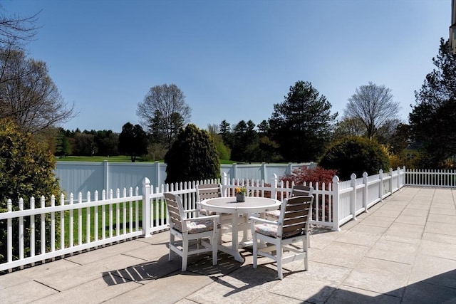 view of patio / terrace with fence and outdoor dining space