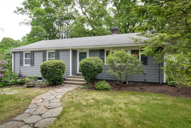 76 Pleasant St S, Natick, MA 01760 - view of front facade featuring a chimney, a front yard, and a shingled roof