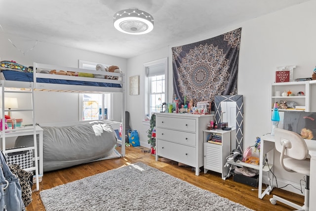 bedroom featuring wood finished floors