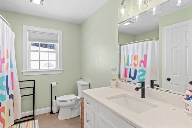 full bath with visible vents, toilet, vanity, baseboards, and tile patterned floors