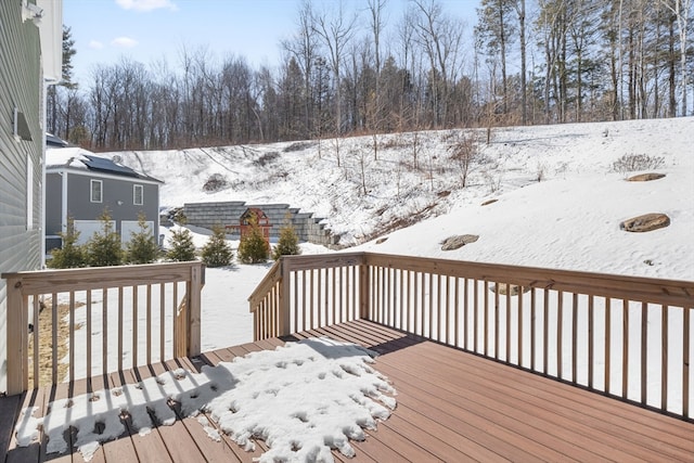 view of snow covered deck