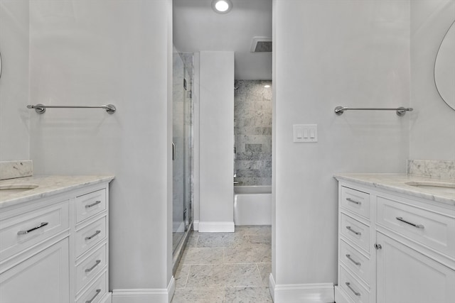 bathroom featuring vanity and walk in shower