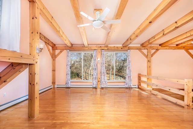 bonus room featuring ceiling fan, light hardwood / wood-style flooring, and beamed ceiling