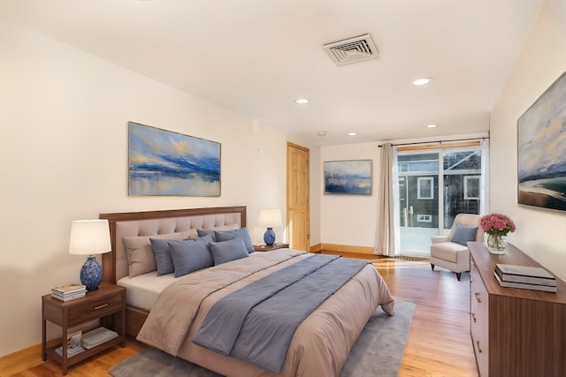 bedroom with light hardwood / wood-style floors