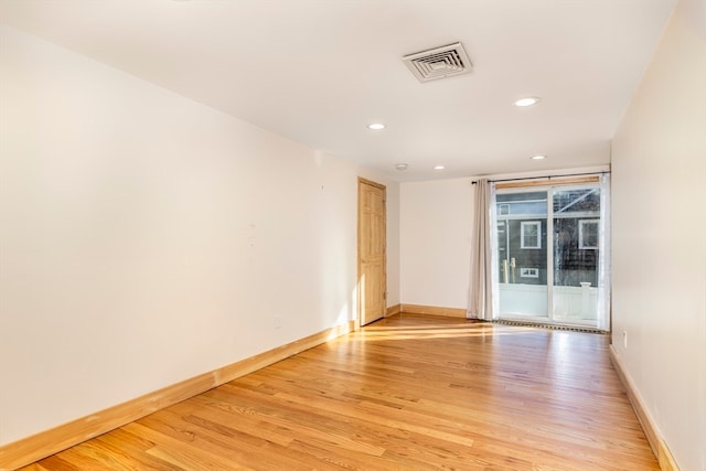 empty room featuring light hardwood / wood-style floors