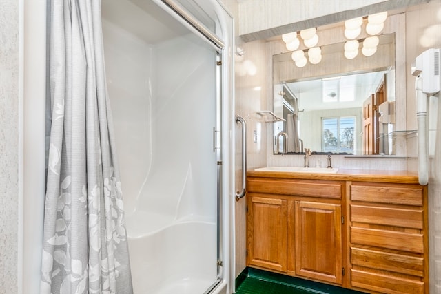 bathroom featuring a shower with curtain and vanity