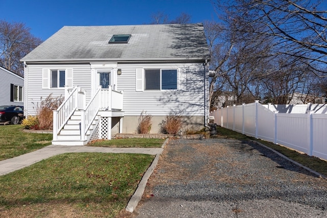 view of front of home featuring a front lawn