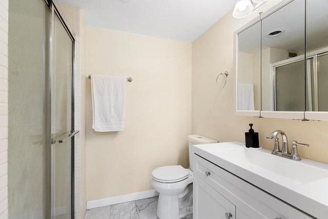 bathroom featuring vanity, toilet, and walk in shower