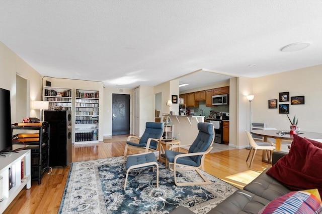 living room featuring light wood-type flooring