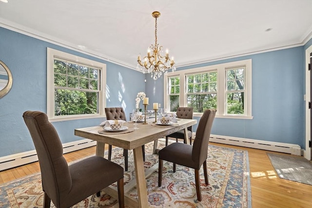 19 Ridge Rd, Newton, MA 02468 - dining space with baseboard heating, ornamental molding, a chandelier, and wood finished floors