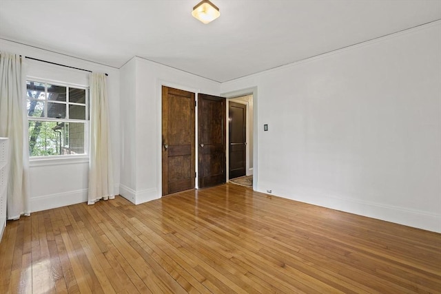 19 Ridge Rd, Newton, MA 02468 - unfurnished bedroom with light wood finished floors and baseboards