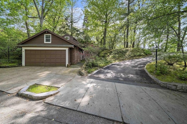 19 Ridge Rd, Newton, MA 02468 - view of front of house with concrete driveway